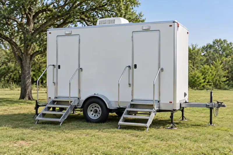 Restroom trailer in an outdoor event setting